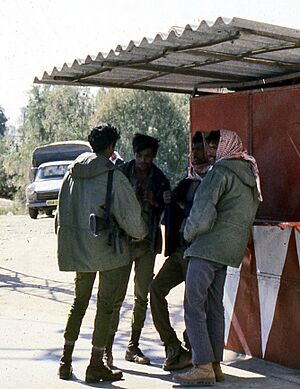 Israeli soldiers and Arabs