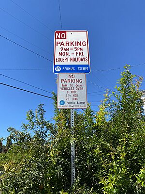 Parking restriction signs in Alsace with Los Angeles County markings