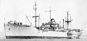 USS Bexar (APA-237) at anchor, circa in the 1960s