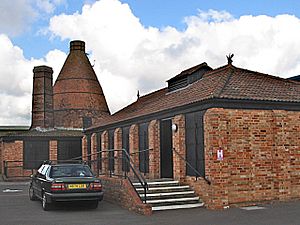 Brick built industrial buildings with conical chimeny