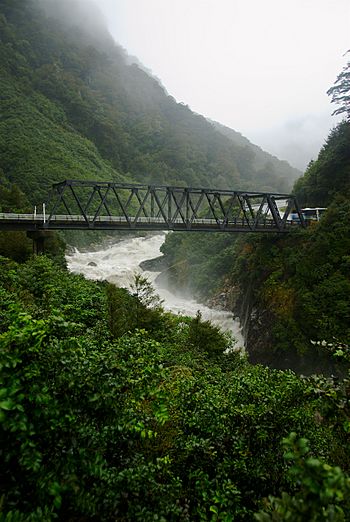 Haast River - in full spate in the mountains.jpg