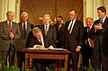 President Bill Clinton signs NAFTA