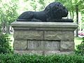 Stone lion at St James Court Old Louisville