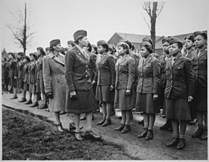 "Somewhere in England, Maj. Charity E. Adams...and Capt. Abbie N. Campbell...inspect the first contingent of Negro mem - NARA - 531249