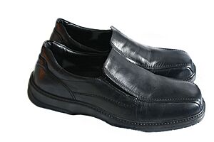 A pair of Blue branded black loafers