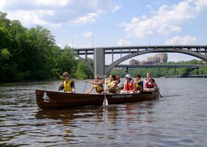 Canoeing by the Franklin Avenue Bridge in Minneapolis