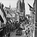 Cheering crowds line the streets as Cromwell tanks of 2nd Welsh Guards enter Eindhoven in Holland, 19 September 1944. BU945