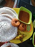 Sponge dosa, media wada, sambar, chutney and potato bhaji.jpg