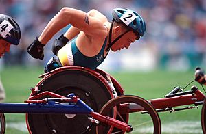 301000 - Athletics wheelchair racing Kurt Fearnley action 3 - 3b - 2000 Sydney race photo