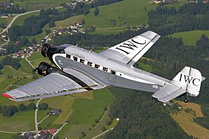 Ju-Air Junkers Ju-52 in flight over Austria.jpg
