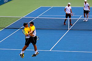 The Bryan Brothers triumphant at the US Open (9662618045)