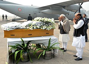 The Prime Minister, Shri Narendra Modi paying homage at the mortal remains of Shri Mufti Mohammad Sayeed, at Palam Airport, in New Delhi on January 07, 2016. The Union Home Minister, Shri Rajnath Singh is also seen (1)