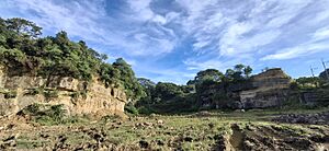 The rocky outcrop of the Guadalupe formation exposed in a quarry at Tibagan, Caypombo, Santa Maria, Bulacan.