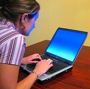 Woman-typing-on-laptop2