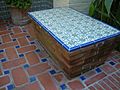 Bench in garden at Biltmore Hotel in Santa Barbara, CA