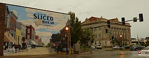 Livingston County Courthouse with mural depicting the community being the home of sliced bread.  The district around the courthouse is on the National Register of Historic Places.