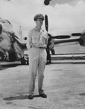 Commander Frederick L. Ashworth in front of the Enola Gay