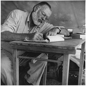 Ernest Hemingway Writing at Campsite in Kenya - NARA - 192655