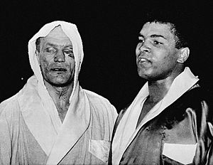 Muhammad Ali and Henry Cooper following their fight on June 18, 1963