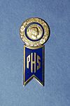 PaulHarrisFellowPinAndSocietyHanger.jpg