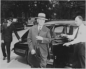 Photograph of Secretary of War Henry Stimson, evidently arriving at the White House for a Cabinet meeting. - NARA - 199142