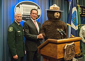 Smokey with Thomas Tidwell, Chief of the United States Forest Service, and Arnold Schwarzenegger