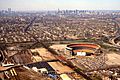 Aerial view Shea Stadium with Manhattan in background 1981