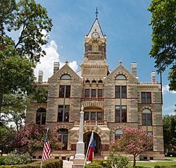 The current Fayette County Courthouse in La Grange was finished in 1891. The Romanesque Revival style building uses four types of native Texas stone to detail the exterior.