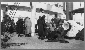 Groups of TITANIC survivors aboard rescue ship CARPATHIA- unidentified group on deck LCCN2002721379