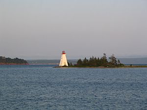 The Kidston Island Lighthouse which also appears on the village seal.