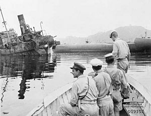 Australian sailors inspecting wrecked ships at Yokosuka September 1945