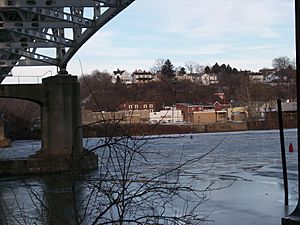 Belle Vernon, as seen from across the Monongahela River in a view showing the underside of the I-70 bridge looking ENE from Speers, PA