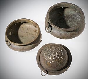 Langstone bronze bowls and wine strainer