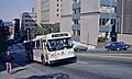 Seattle AM General trolleybus climbing James St near 5th Ave in 1983