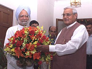 The Prime Minister Dr. Manmohan Singh with the former Prime Minister Shri Atal Bihari Vajpayee in New Delhi on May 24, 2004