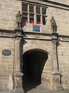 The entrance to the original (1630) Shrewsbury school - in greek = if you love learning you will become learned - panoramio