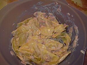 Tortelines con salsa caruso