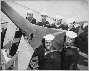 "A gun crew of six Negroes who were given the Navy Cross for standing by their gun when their ship was damaged by enemy - NARA - 520688
