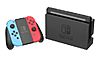 A Nintendo Switch in docked mode with Neon Blue & Neon Red Joy-Con controllers in grip