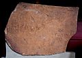 Safaitic script with a figure of a camel on a red sandstone fragment, from es-Safa, currently housed in the British Museum
