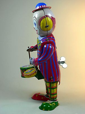 Unknown Chinese Maker Tin Wind Up Clown Drummer Side