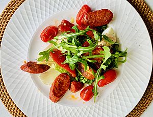 Chorizo, roasted capsicum, tomatoes, hard boiled eggs and rocket salad