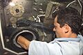 ISS-08 Pedro Duque works at the Microgravity Science Glovebox