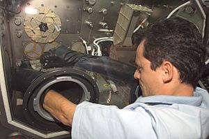 ISS-08 Pedro Duque works at the Microgravity Science Glovebox