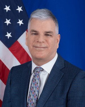 Marc Ostfield, U.S. Ambassador.png