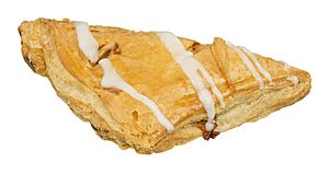 A picture of an apple-filled turnover, bought from a diner