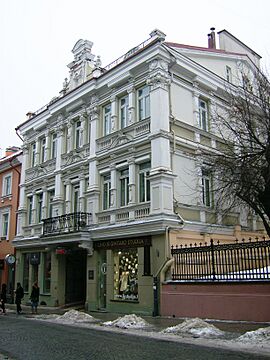 A large white building in winter