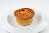 Pork pie on plate.jpg