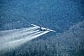 110303-F-XN622-007 U.S. Air Force aircraft spraying defoliant