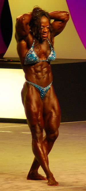 Iris Kyle posing at 2008 Ms. Olympia (cropped).jpg